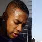 Robinho autografa camisas depois de entrevista no Centro de Treinamento Rei Pelé, em Santos