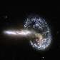 Esse é o resultado da colisão entre duas galáxias, fotografada pelo Hubble