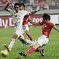 Park Ji-sung, da Coreia do Sul escora e marca gol sobre o Irã, de Nekounam Javad