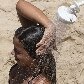 Tarde de domingo com sol leva cariocas à praia de Ipanema