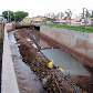 Operários trabalham nas obras antienchentes em Ribeirão Preto. 08/03/2010