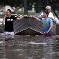 Segundo meteorologistas, o rio Brisbane poderá elevar seu nível mais um metro, chegando a 5,5