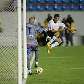 Goleiro Cristiano, do Rio Branco, dribla Defederico, atacante do Corinthians 
