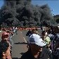 Protesto em frente ao Estádio Nacional de Brasília questiona custo do Mané Garrincha