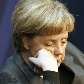 Merkel adormece durante discurso de Bill Gates