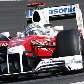 Jarno Trulli se prepara para contornar curva com seu Toyota no GP do Japão Jarno Trulli se prepara para contornar curva com seu Toyota no GP do Japão