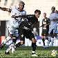 Marcos Assunção, do Grêmio Prudente, tenta roubar a bola de Jorge Henrique, do Corinthians