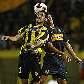 Edgar Pérez, do Táchira, e Bataglia, do Boca Juniors, disputam bola Edgar Pérez, do Táchira, e Bataglia, do Boca Juniors, disputam bola