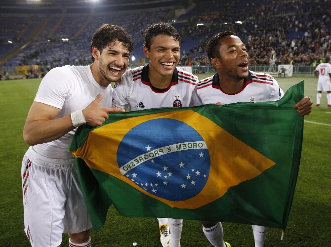 Alexandre Pato, Thiago Silva e Robinho comemoram a conquista do Italiano 2010-11 pelo Milan