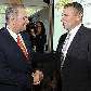 Jacques Rogge, presidente do COI, cumprimenta o ex-saltador Sergey Bubka