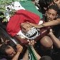 Palestinos enterram as 13 vítimas mortas por soldados israelitas na fronteira com Líbano Palestinos enterram as 13 vítimas mortas por soldados israelitas na fronteira com Líbano