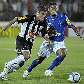 Ricardinho, do Atlético-MG, disputa bola com Marquinhos Paraná, do Cruzeiro - que venceu por 1 a 0 Ricardinho, do Atlético-MG, disputa bola com Marquinhos Paraná, do Cruzeiro - que venceu por 1 a 0