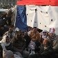 Na Praça Tahrir, egípcios protestam contra governo militar e comemoram um ano sem Hosni Mubarak