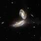 Par de galaxia interagindo; começando a se juntar