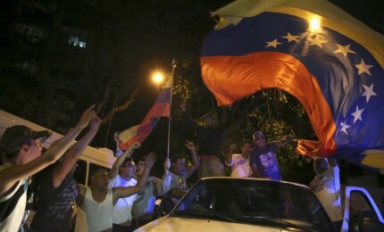 Após vitória, oposição diz que mudança já começou na Venezuela