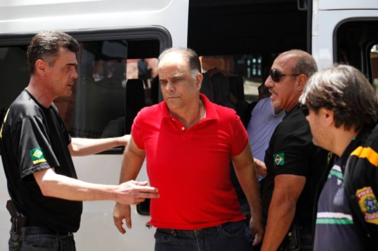 Marcos Valério ao ser transferido para o Instituto Médico-Legal (IML), em Belo Horizonte