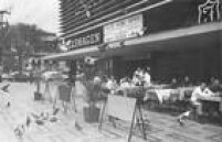 Vista parcial da Avenida Paulista, no Conjunto Nacional com detalhe para mesas do Restaurante Fasano. Ao fundo a esquina com a rua Padre João Manuel. São Paulo, SP, 18/12/1969.