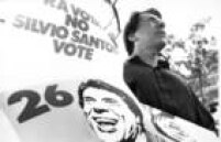 <a href='http://https://acervo.estadao.com.br/noticias/acervo,silvio-santos-foi-candidato-a-presidente-em-1989,70002501172,0.htm' target='_blank'>Sílvio Santos</a> durante campanha eleitoral para presidente da República em São Paulo. SP, 06/11/1989. O apresentador e dono do SBT chegou a fazer campanha e articular sua candidatura pelo PMB, mas teve candidatura vetada pelo TSE.