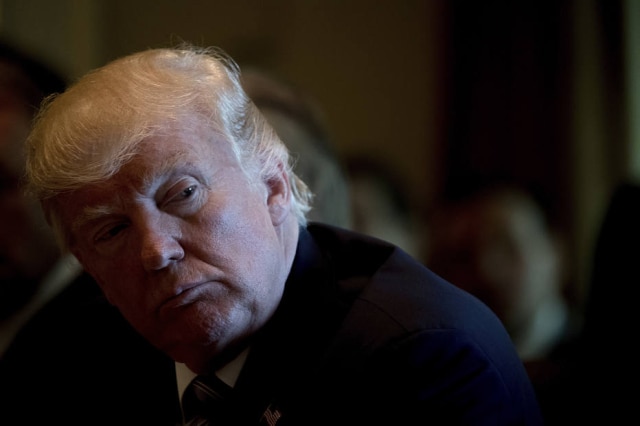 AP Photo/Andrew Harnik Donald Trump, presidente dos EUA