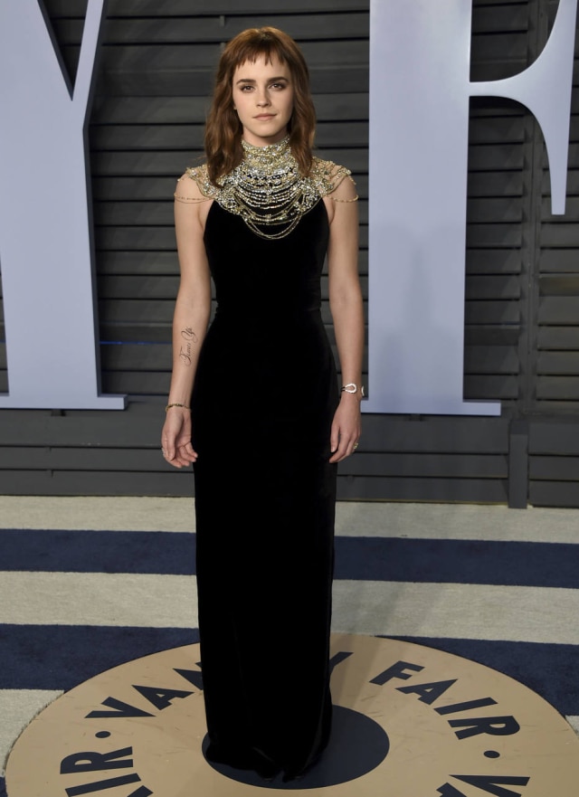 Evan Agostin/Invision/AP Emma Watson arrives at the Vanity Fair Oscar Party on Sunday, March 4, 2018, in Beverly Hills, Calif. (Photo by Evan Agostini/Invision/AP)