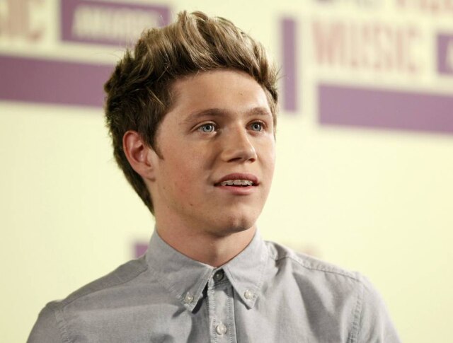 Danny Moloshok/Reuters O cantor irlandês Niall Horan compartilhou bilhete que pais de um recém-nascido deram a ele em um voo