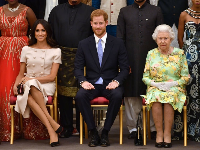 John Stillwell/Pool via Reuters Meghan Markle, príncipe Harry e rainha Elizabeth II durante o evento Queen's Young Leaders