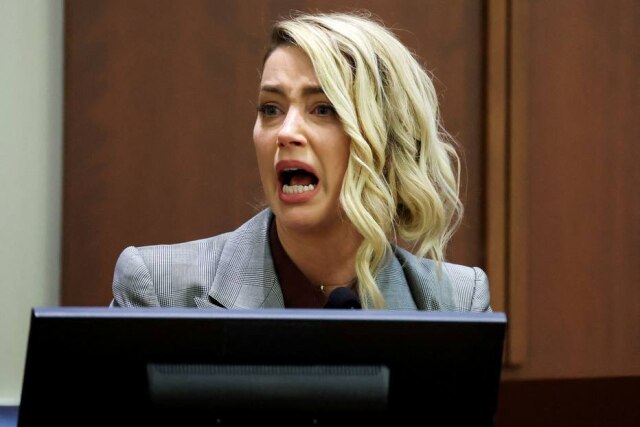 Michael Reynolds/Pool via REUTERS Amber Heard diz sofrer ameaças de morte durante o julgamento do processo contra Johnny Depp.