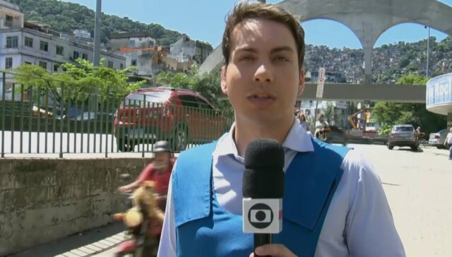 Reprodução de 'RJ1' (2018) / Globo O gato Chiquinho aparece novamente em transmissão.