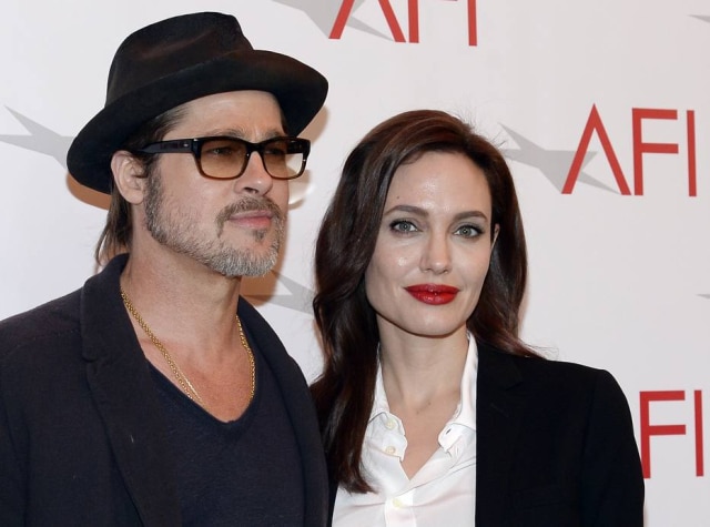 REUTERS/Kevork Djansezian Brad Pitt e Angelina Jolie teriam se visto cara a cara há dois meses pela primeira vez depois do divórcio