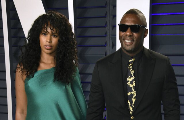 Evan Agostini/Invision/AP Idris Elba e Sabrina Dhowre na festa da revista Vanity Fair para o Oscar