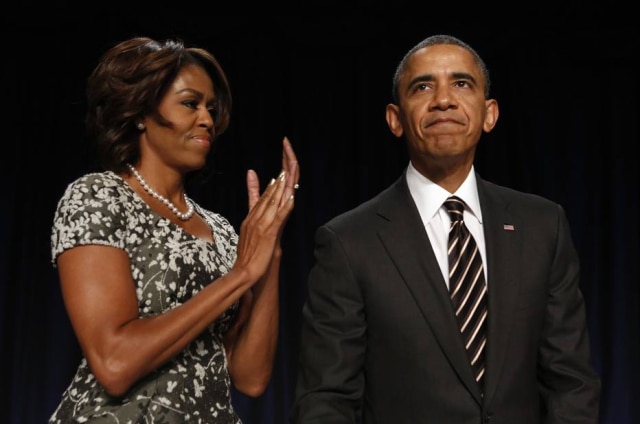 Kevin Lamarque/Reuters Ex-presidente Barack Obama e sua mulher, Michelle