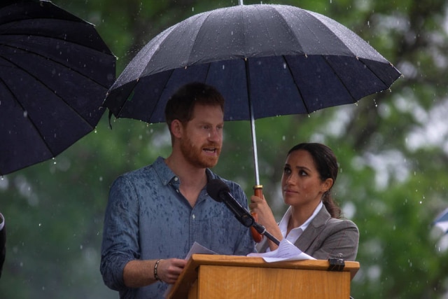 Ian Vogler/Pool via REUTERS O príncipe Harry e Meghan Markle, duque e duquesa de Sussex, em viagem à Austrália.