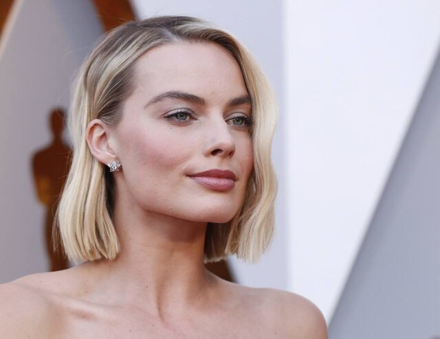 Mario Anzuoni/Reuters A atriz Margot Robbie disse em entrevista que no início sua família não apoiou a decisão de se tornar atriz
