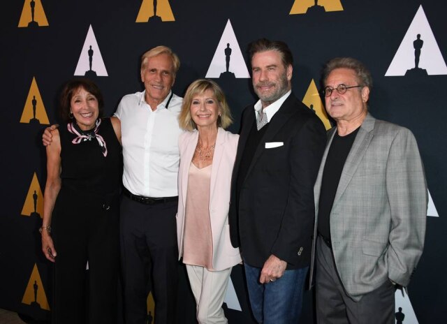 Mark RALSTON / AFP Elenco de 'Grease' comemora 40 anos do musical de sucesso.