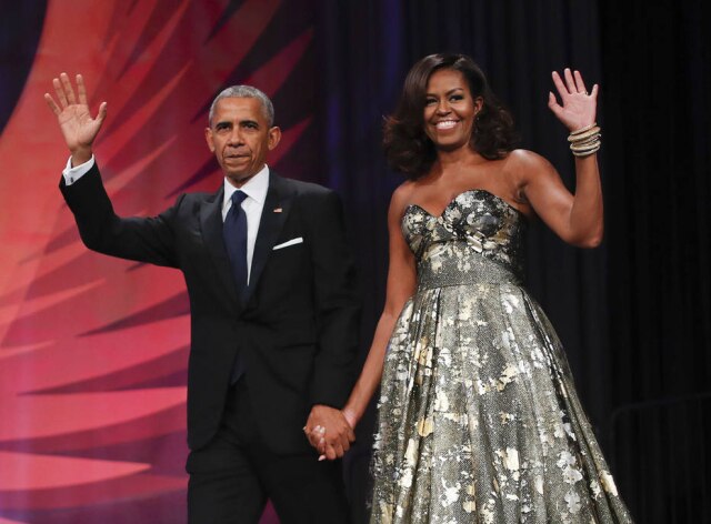 AP Photo/Pablo Martinez Monsivais, File Foto de setembro de 2016 mostra Barack Obama e Michelle Obama, em Washington