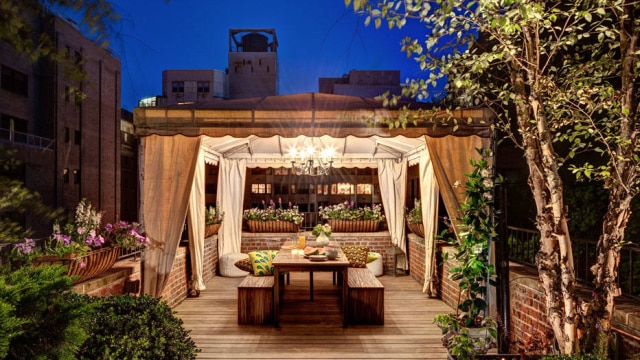 Bruce Buck/NYT The rooftop garden and terrace at the remodeled condominium of Cristiane Peixoto and Marcus Silberman, New York, June 7, 2014. The three-level terrace was designed by Maureen Hackett in 2005 and updated by Peter Pawlak last year. (Bruce Buck/The New York Times)