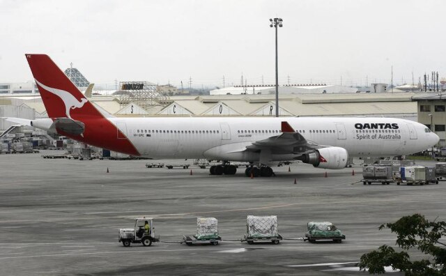 Cheryl Ravelo/Reuters Avião da companhia aérea Qantas no Aeroporto Internacional Ninoy Aquino, nas Filipinas.