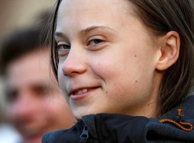 Guglielmo Mangiapane/ Reuters A ativista das mudanças climáticas Greta Thunberg discursa no protesto 'Fridays for Future' ('Sextas-feiras pelo futuro') em Turim, na Itália, em 13 de dezembro
