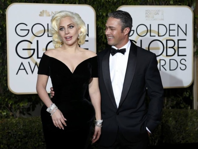 Reuters Lady Gaga e o ator Taylor Kinney foram juntos ao Globo de Ouro deste ano