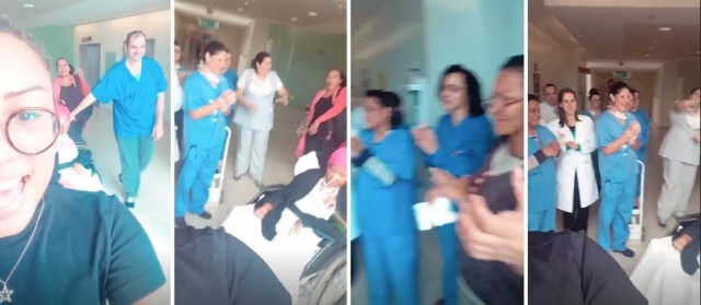 Instagram / @deisefatfamily Familiares, amigos e funcionários do hospital cantam 'Parabéns' para Deise em frente a uma janela da instituição.