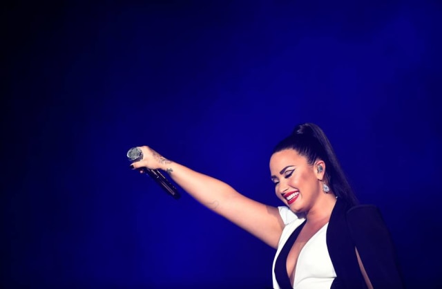 AFP PHOTO / MIGUEL RIOPA A cantora Demi Lovato durante sua performance no Rock in Rio Lisboa 2018.