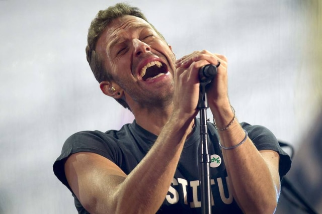 REUTERS/Carlo Allegri Na imagem, Chris Martin, vocalista do Coldplay.