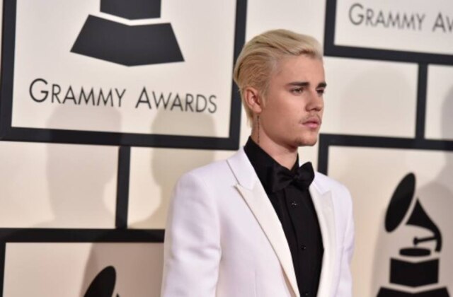 AP Justin Bieber não se conteve ao responder paparazzo.