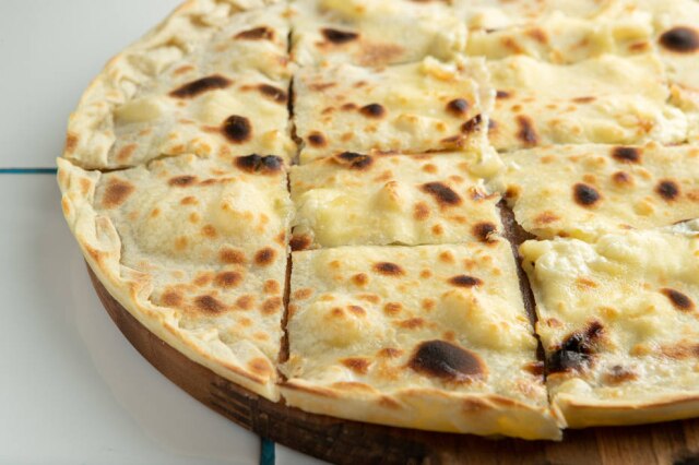 Daniel Teixeira/Estadão Focaccia recco recheada de queijo stracchinio