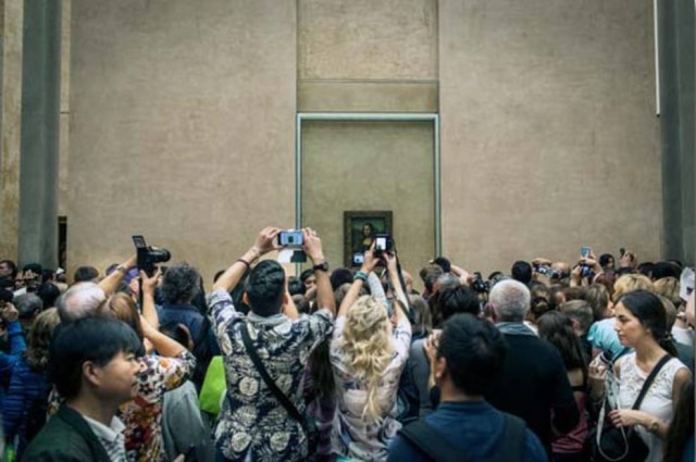 Guia Besana para o New York Times A Mona Lisa no museu do Louvre, em Paris