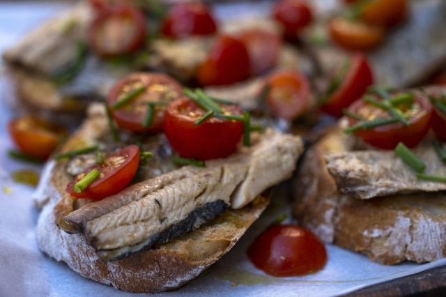 Sardines roasted with fresh tomatoes at Aduela, a bar in Porto, Portugal