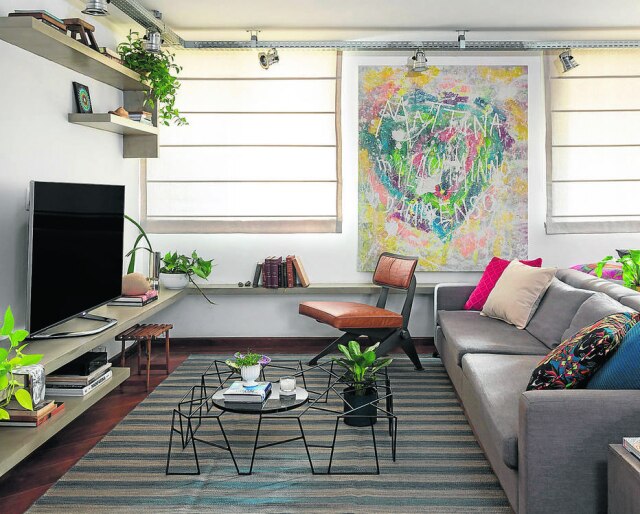 Evelyn Muller Área social do apartamento reformado e decorado pela H2C Arquitetura