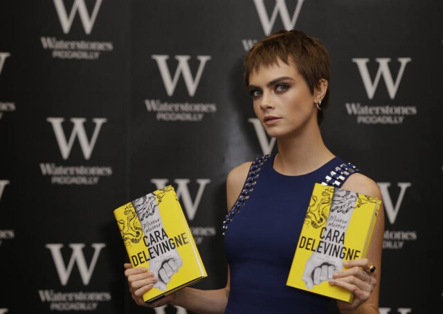 AP Photo/Alastair Grant Cara Delevingne aparece com novo cabelo