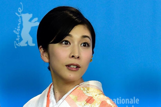 John MacDougall / AFP A atriz Yuko Takeuchi no 66º Festival de Cinema de Berlim, em 2016