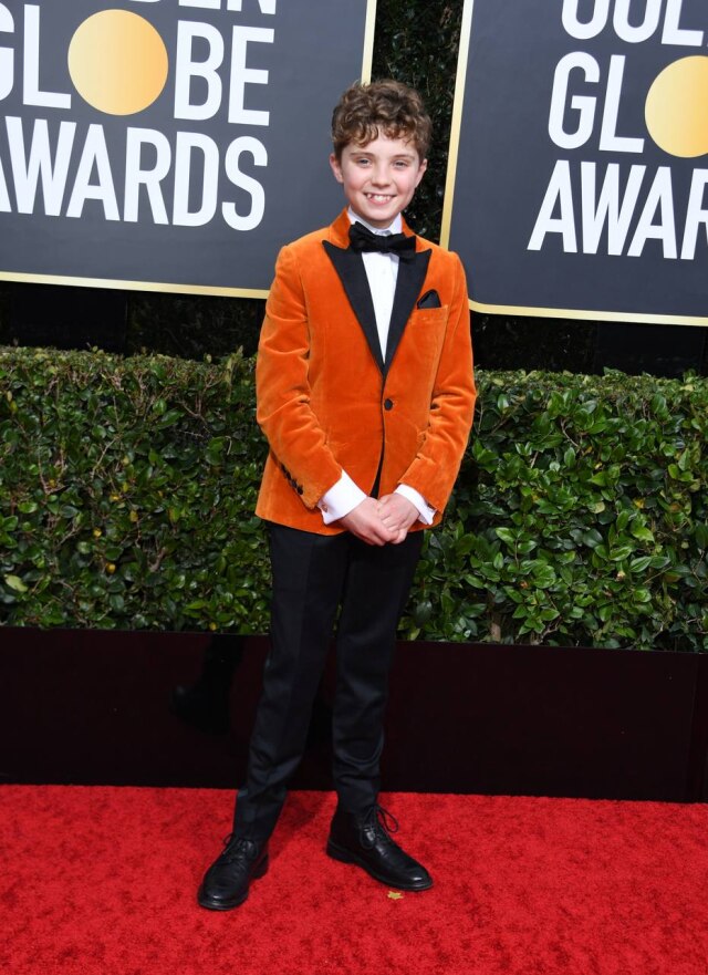 Valerie Macon/ AFP Roman Griffin Davis chega ao tapete vermelho do Globo de Ouro